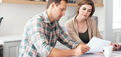 couple looking at finance papers