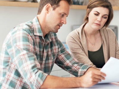 couple looking at finance papers