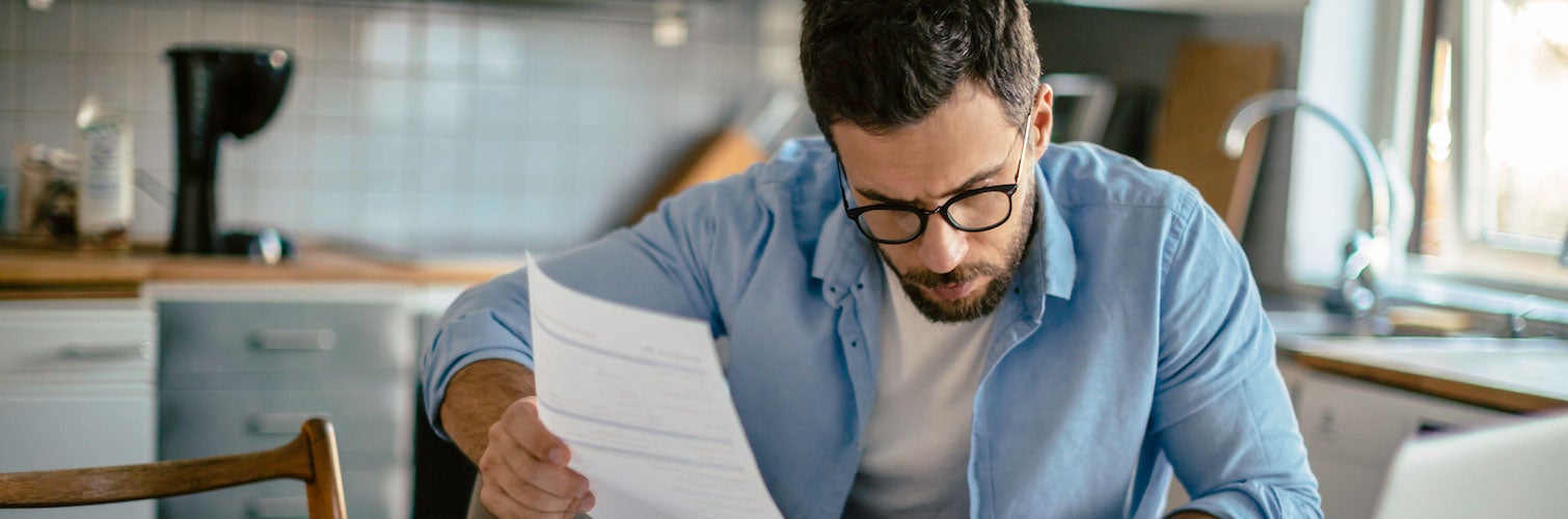 man checking debt