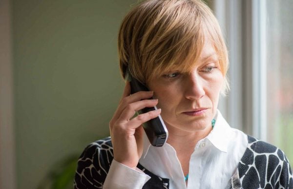 woman on phone speaking with lender