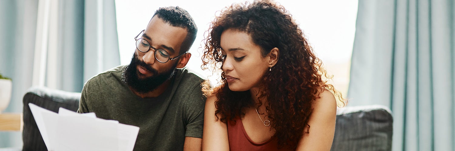 Married couple reviewing mortgage