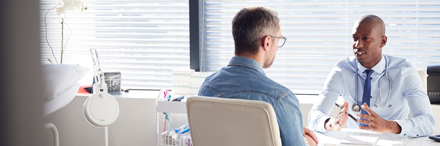 Man consulting with doctor