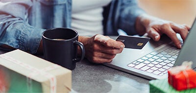 Person holding credit card