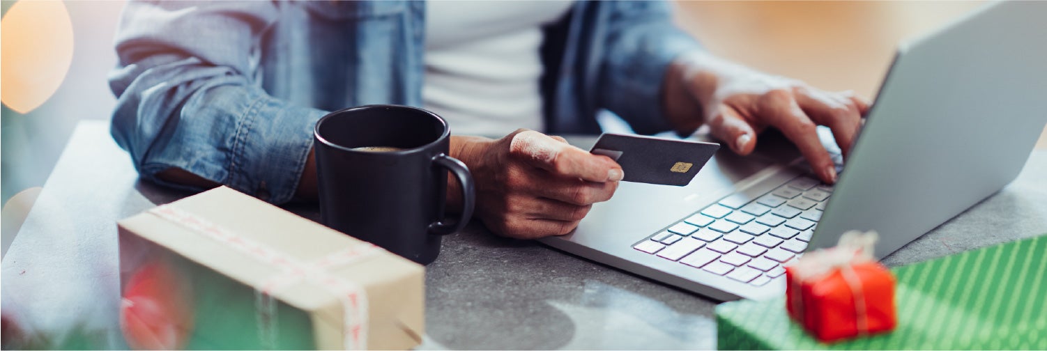 Person holding credit card