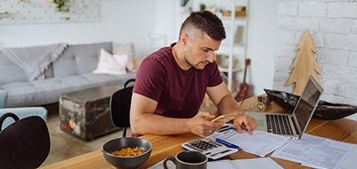 Man dealing with debt collectors.