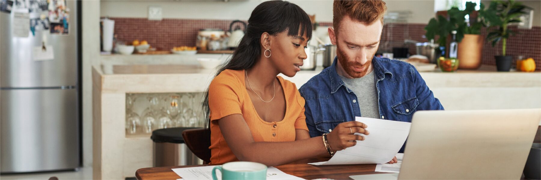 Couple reviewing finances.