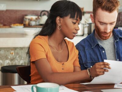 Couple reviewing finances.