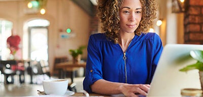 Woman looking up her credit score.