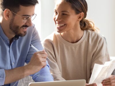 Couple looking at finances together.