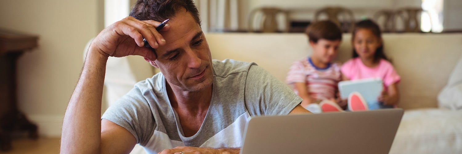 Man staring at computer.