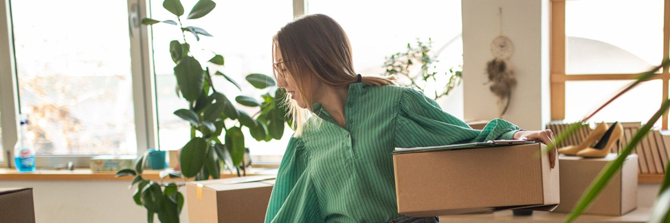 woman moving boxes