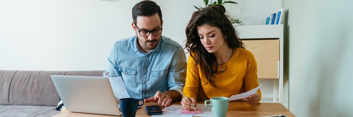 A couple looks at finances together
